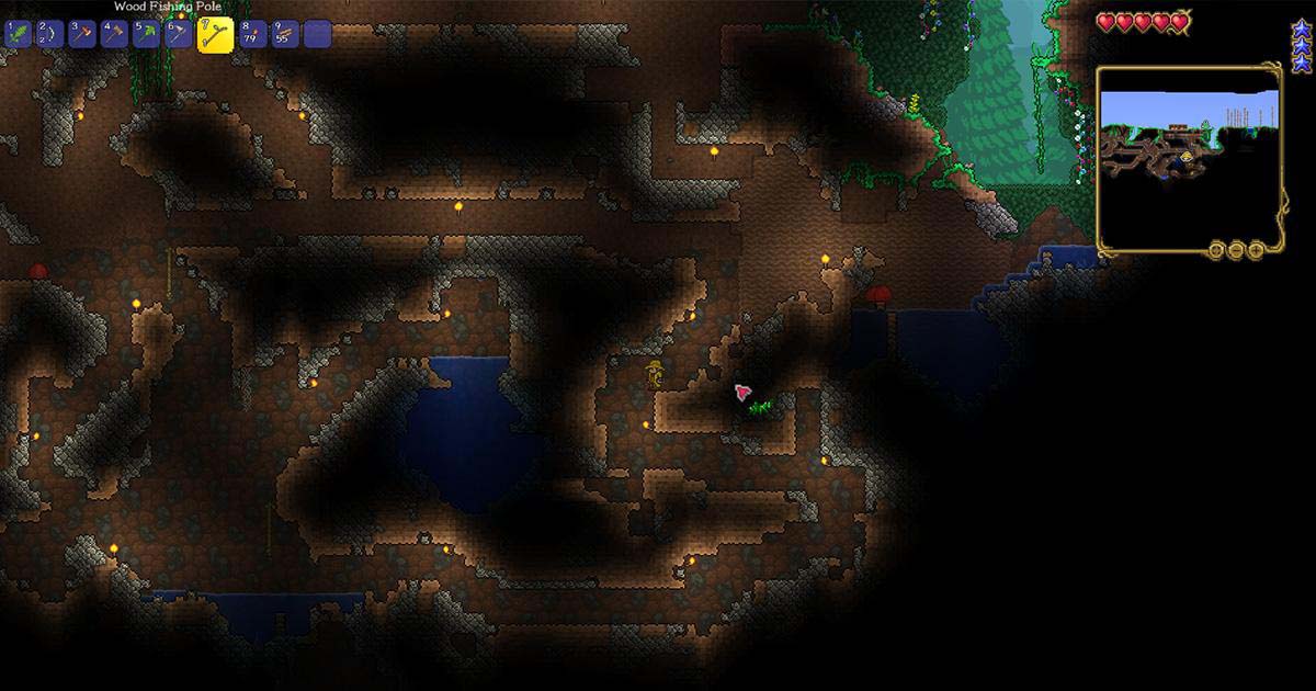 テラリアの地下洞窟を探索しているゲーム内画面