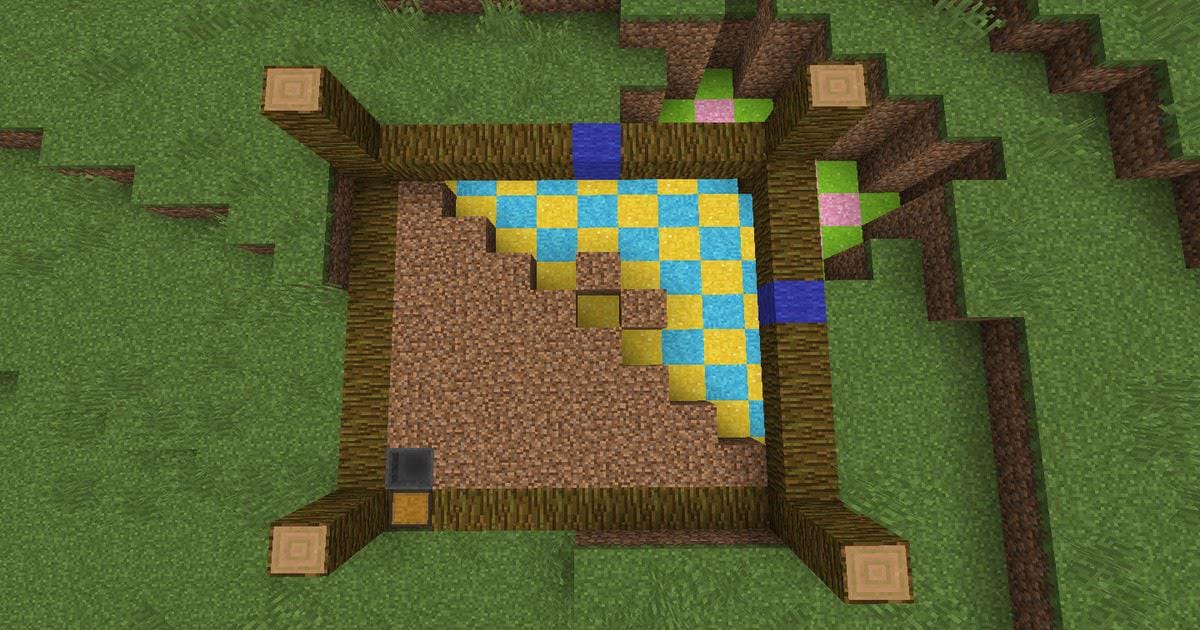 マインクラフトで畑に土ブロックを配置して耕地を作っている様子