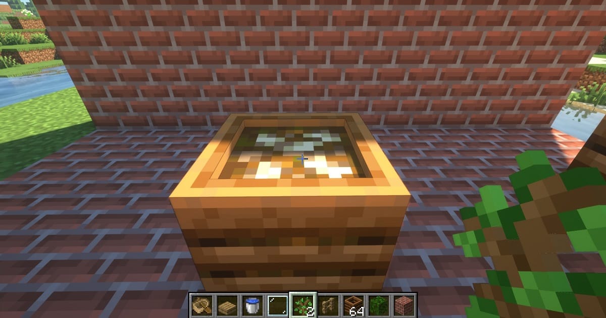 マイクラコンポスターの中に葉を入れて土に見せかけるゲーム内画面